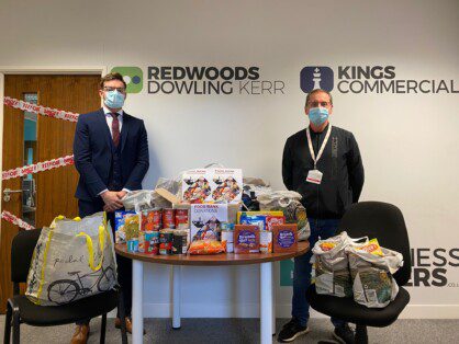 Redwoods Dowling Kerr donate to local foodbank